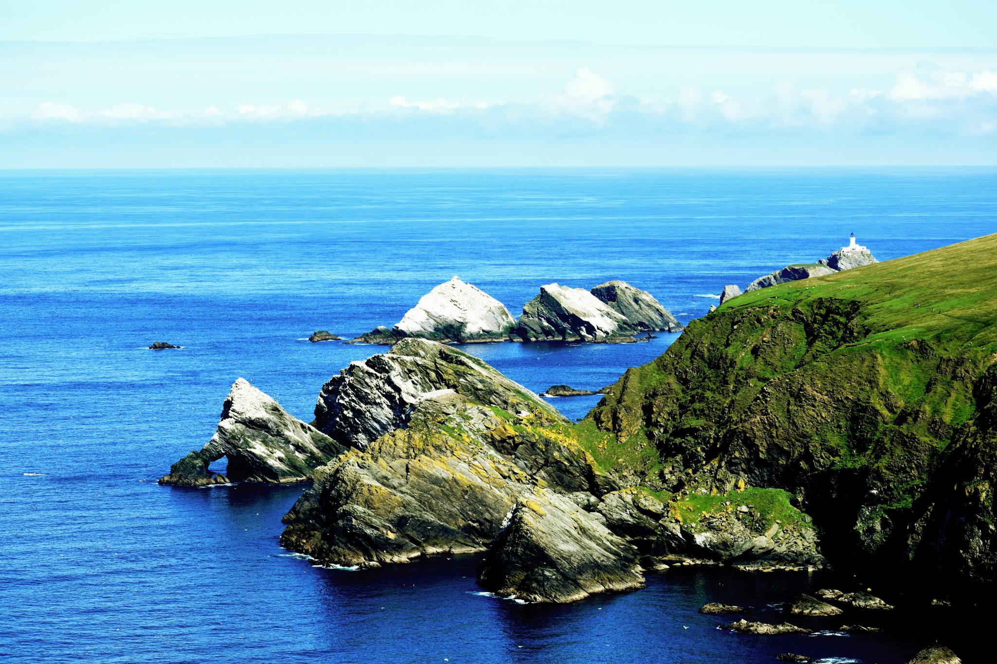 The Muckleflugga lighthouse Hermaness Nature Reserve Shetlands-unsplash